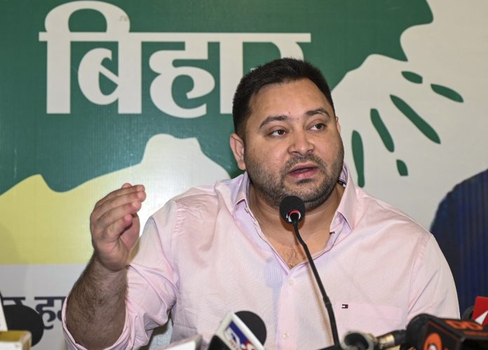 Tejashwi Yadav presenting the INDIA bloc manifesto for Bihar